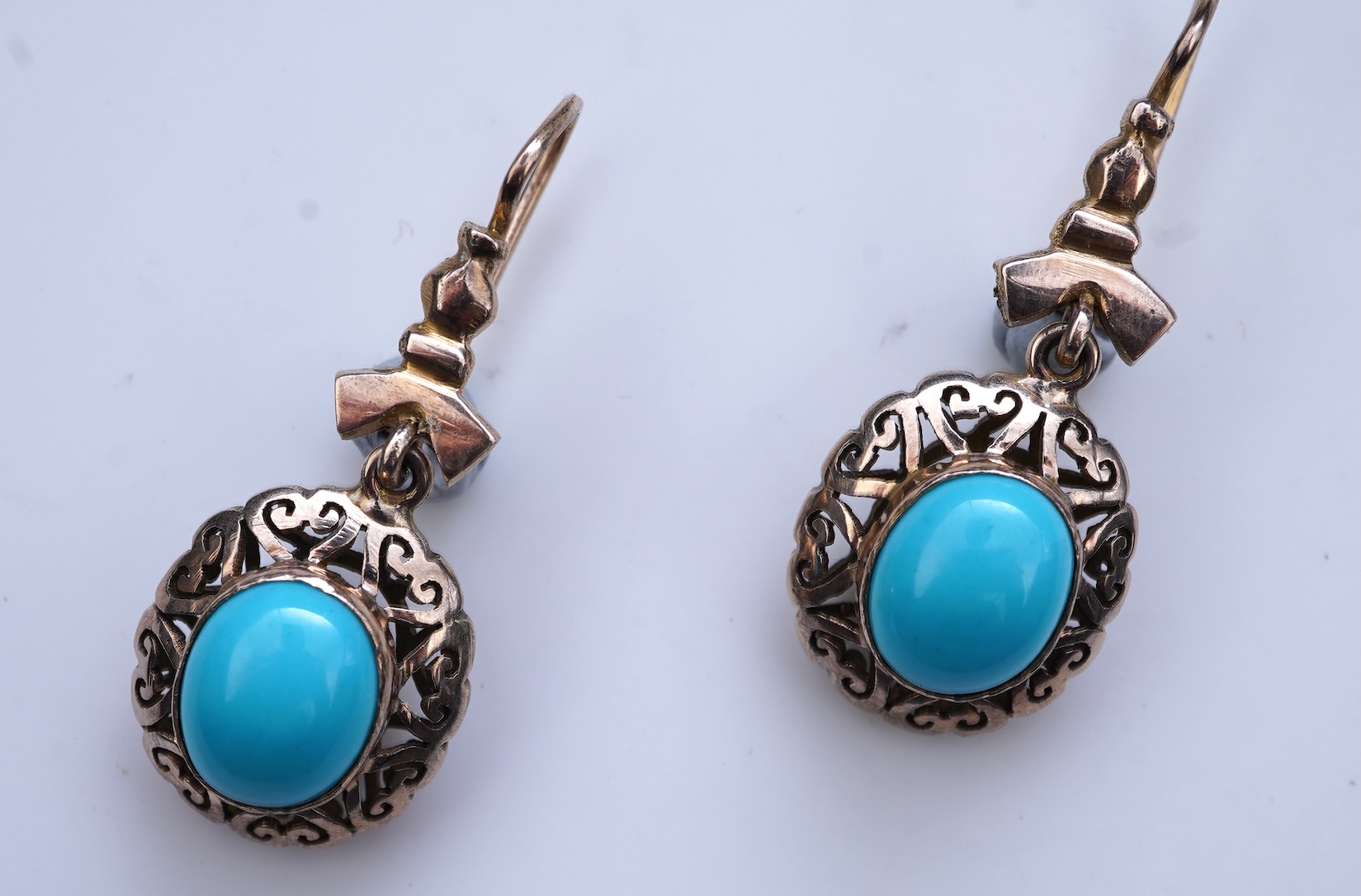 A pair of simulated turquoise earrings